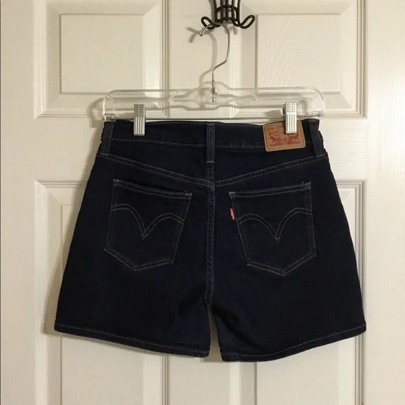 Levi’s Mid rise dark blue shorts size 27 - Picture 1 of 9